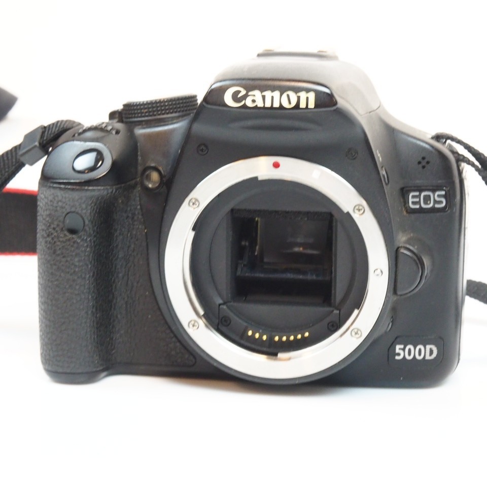 Canon EOS 500D 15.1MP Digital SLR *Camera Body and one battery Only* 45K clicks 2 Canon EOS 500D 15.1MP Digital SLR *Camera Body and one battery Only* 45K clicks