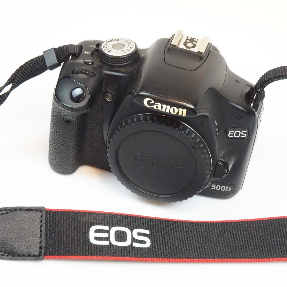 Canon EOS 500D 15.1MP Digital SLR *Camera Body and one battery Only* 45K clicks 7 Canon EOS 500D 15.1MP Digital SLR *Camera Body and one battery Only* 45K clicks